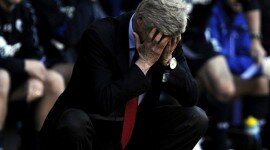 Arsenal's coach Wenger reacts during their English Premier League soccer match against Bolton Wanderers in Bolton