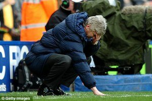 Arsene down and out 